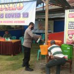 Kapolsek Budong-Budong Pantau Pos Covid-19 dalam Penerapan PPKM Skala Mikro