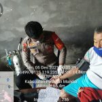 Meski Diguyur Hujan, Polres Polman Tetap Berikan Vaksinasi Kepada Masyarakat